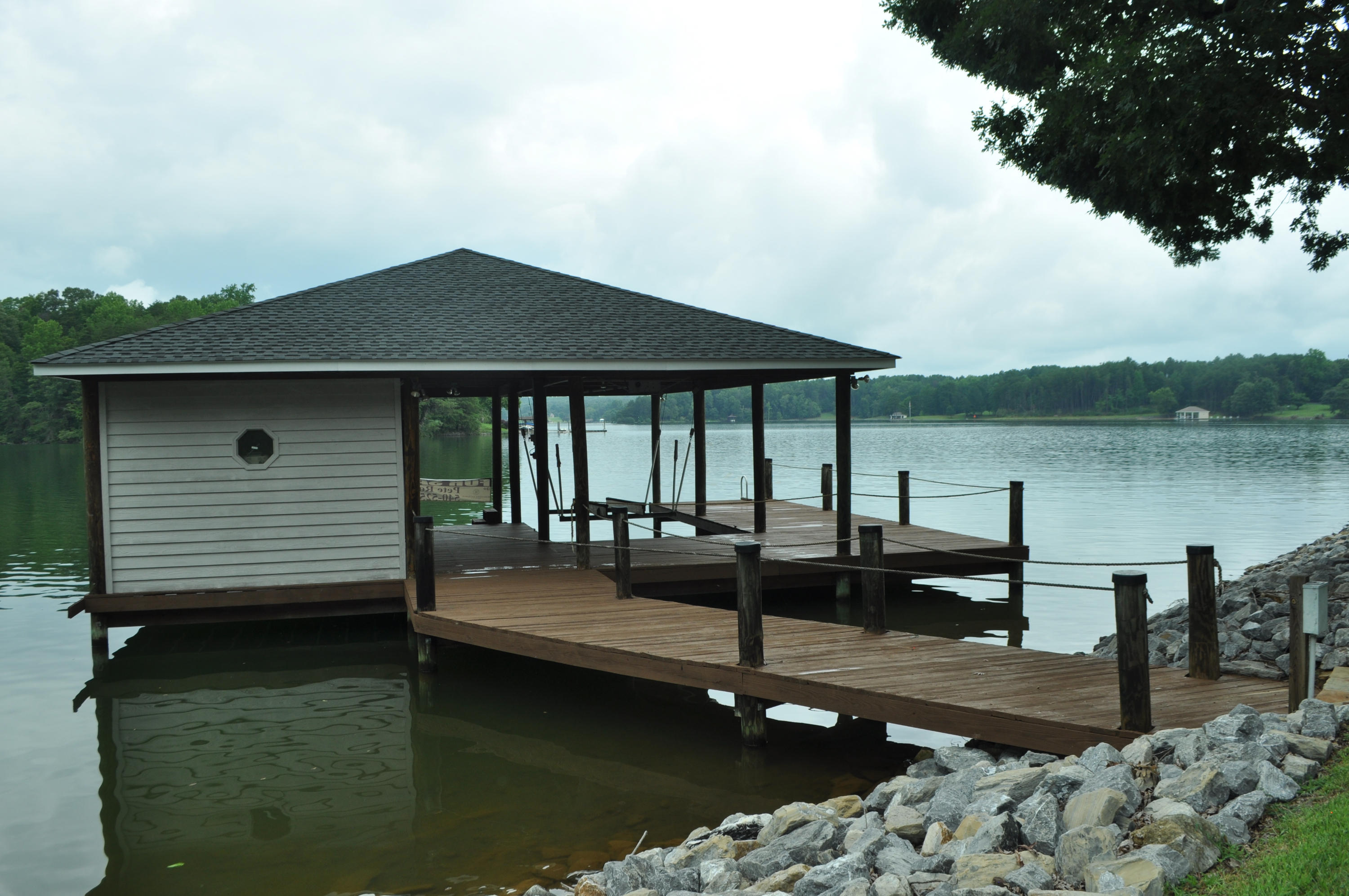 925 Somerset Cove Road Union Hall, VA 24176 - Photo 33 of 35 a backyard of a house with lake view and city view