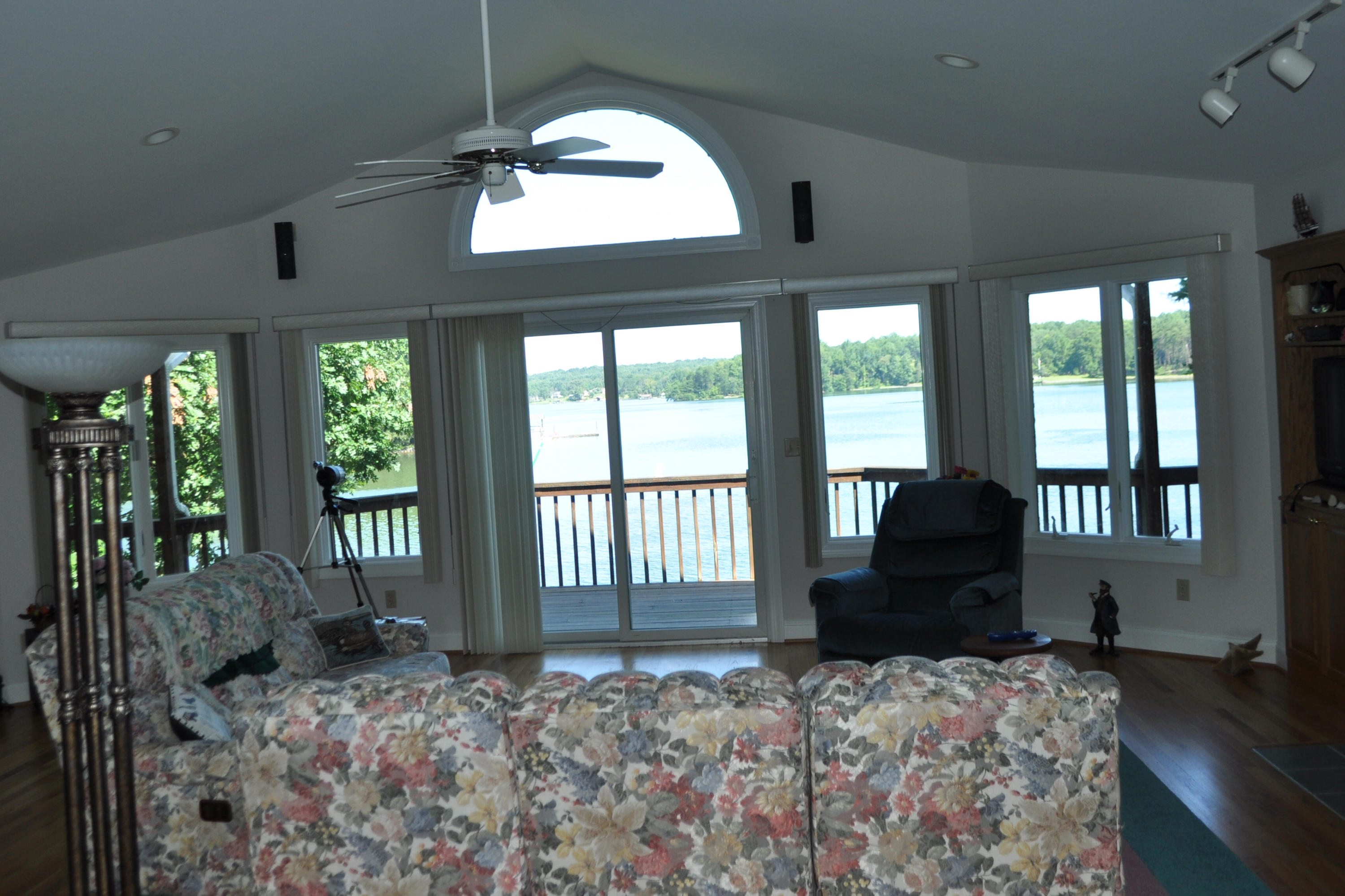 925 Somerset Cove Road Union Hall, VA 24176 - Photo 6 of 35 a bedroom with a bed and large windows