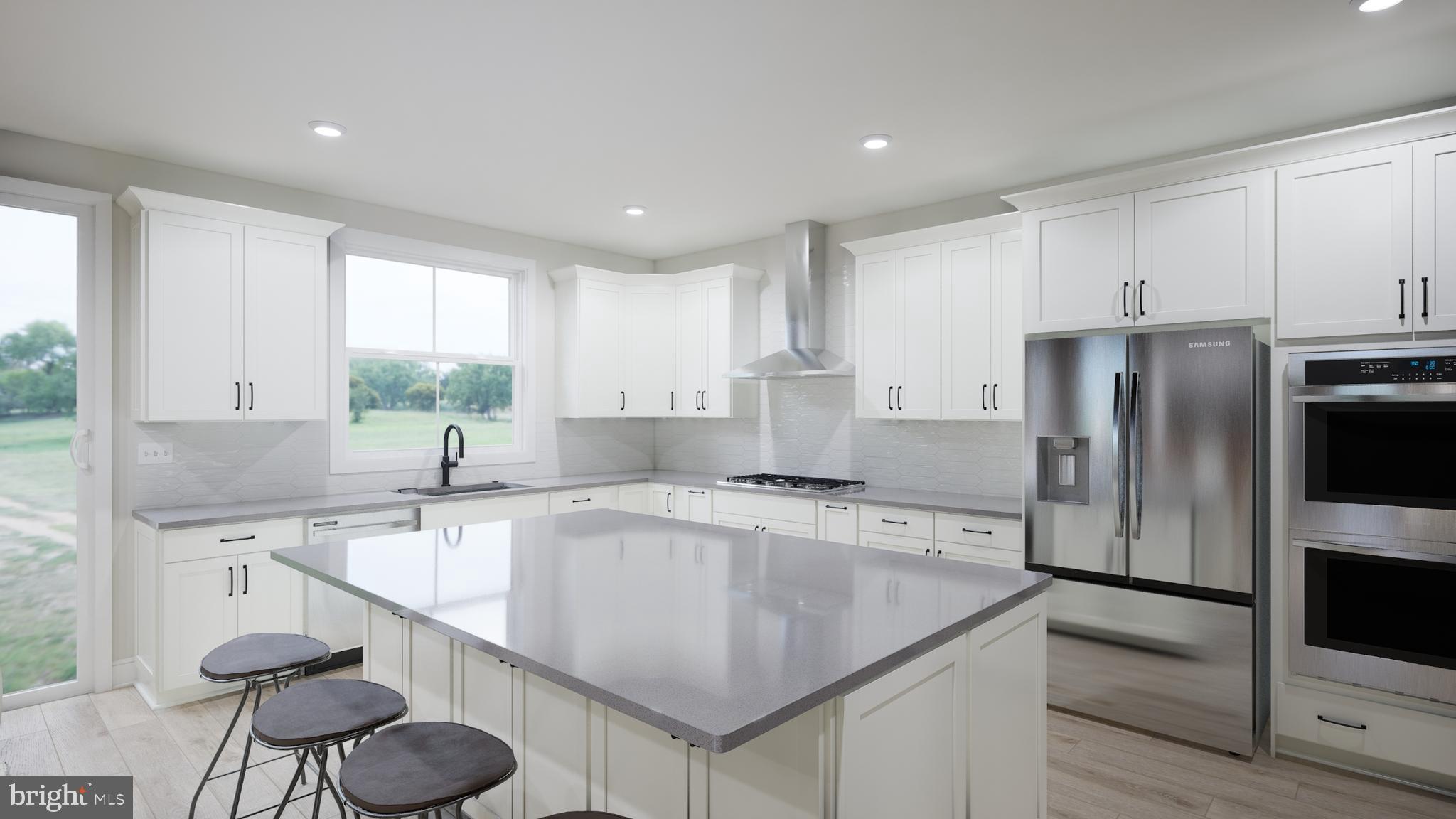 Snowden Bridge Boulevard, Unit SHELDON Stephenson, VA 22656 - Photo 13 of 53 a kitchen with a center island appliances and cabinets