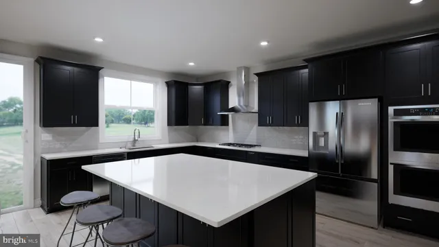 a spacious bathroom with a granite countertop sink a toilet and with a vanity