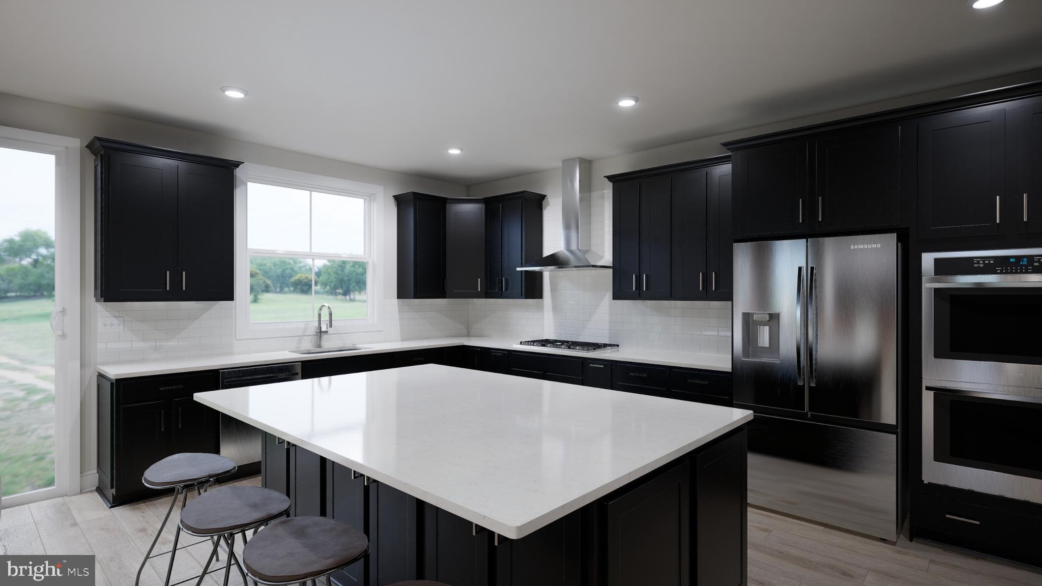 Snowden Bridge Boulevard, Unit SHELDON Stephenson, VA 22656 - Photo 25 of 53 a kitchen with a table chairs refrigerator and microwave