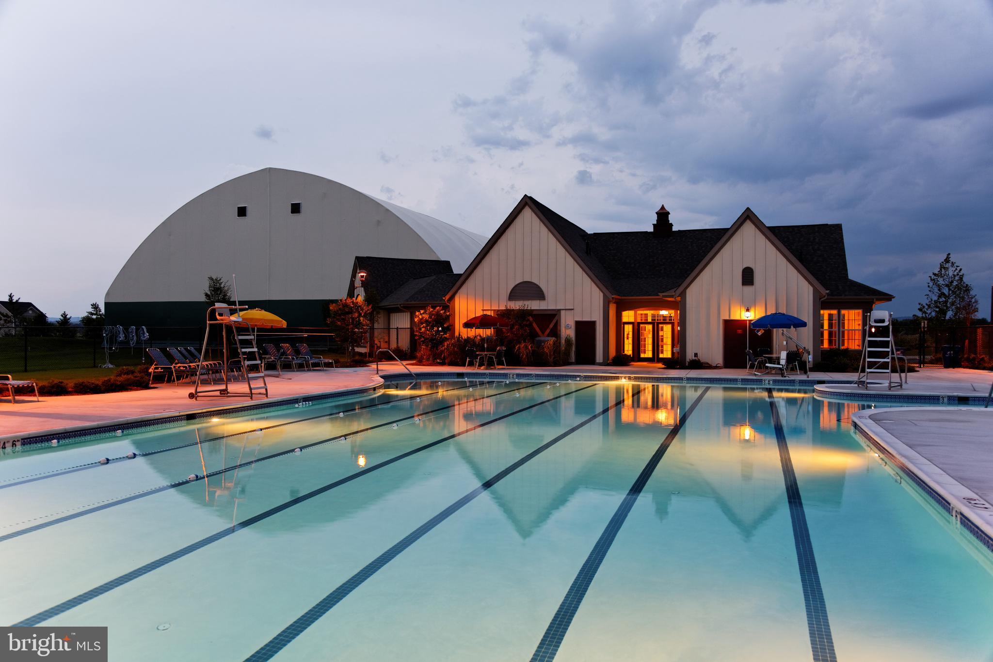 Snowden Bridge Boulevard, Unit SHELDON Stephenson, VA 22656 - Photo 51 of 53 a view of swimming pool with chairs and a yard