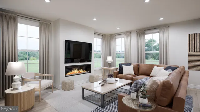 a living room with furniture and a view of living room