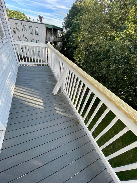 6 Calder Street, Unit 3 Boston, MA 02124 - Photo 5 of 23 a view of wooden balcony with outdoor space