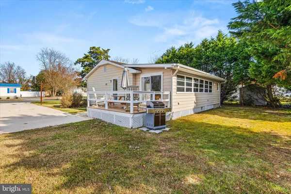 a front view of a house with a porch