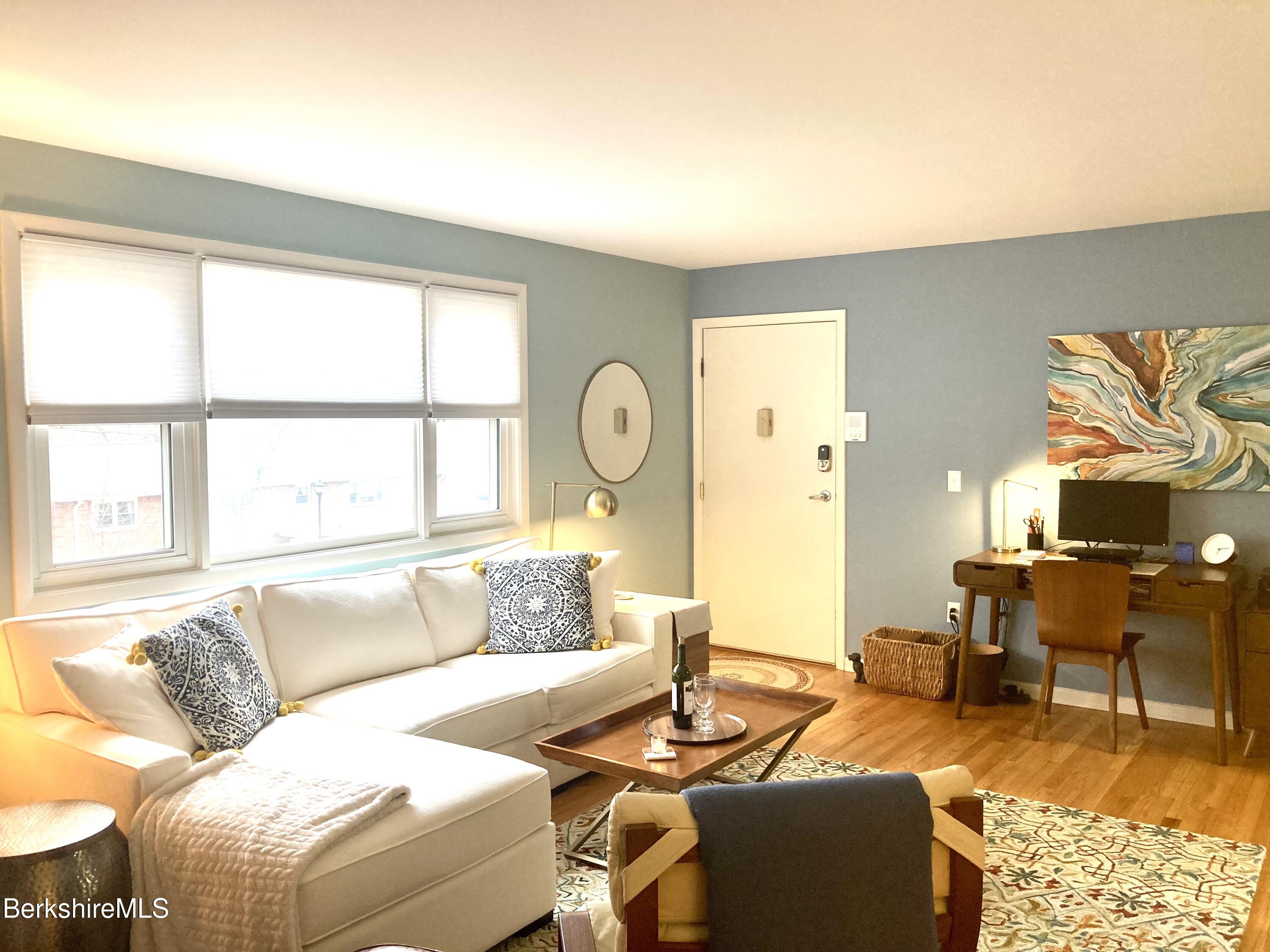 2 Morgan Manor, Unit 6 Lenox, MA 01240 - Photo 5 of 32 a living room with furniture a rug and a large window