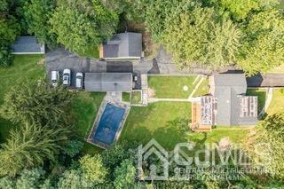237 Amboy Road Old Bridge, NJ 07747 - Photo 1 of 39 an aerial view of a house with pool outdoor seating and yard