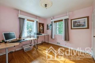 237 Amboy Road Old Bridge, NJ 07747 - Photo 19 of 39 a bedroom with furniture and a window