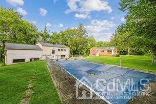 237 Amboy Road Old Bridge, NJ 07747 - Photo 22 of 39 a view of a house with a yard