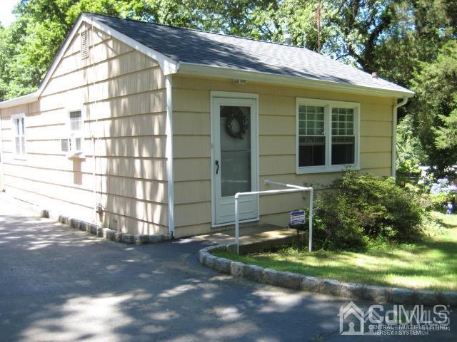 237 Amboy Road Old Bridge, NJ 07747 - Photo 27 of 39 a view of a house with a yard and sitting area