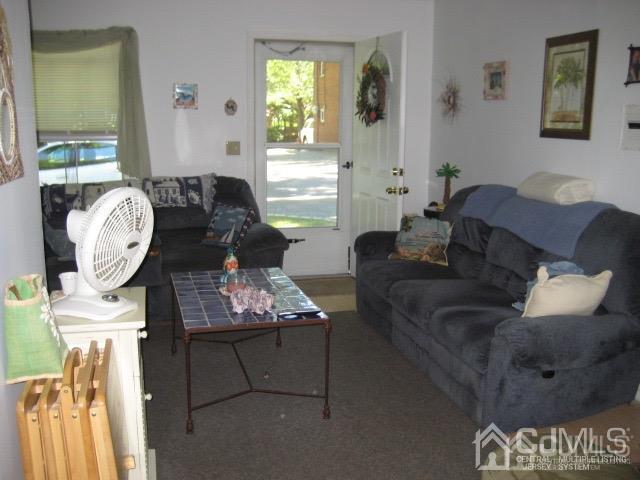 237 Amboy Road Old Bridge, NJ 07747 - Photo 28 of 39 a living room with furniture and a window