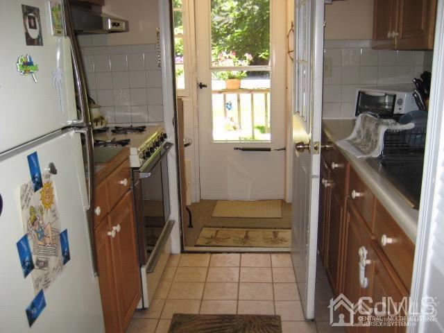 237 Amboy Road Old Bridge, NJ 07747 - Photo 30 of 39 a bathroom with a granite countertop shower and a sink