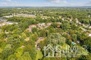 237 Amboy Road Old Bridge, NJ 07747 - Photo 37 of 39 a view of a city with lush green forest