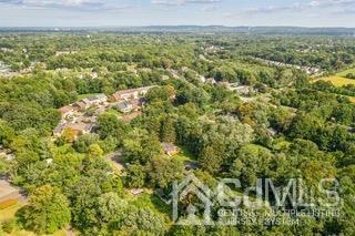 237 Amboy Road Old Bridge, NJ 07747 - Photo 39 of 39 a view of a city with lush green forest