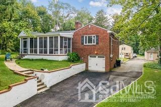237 Amboy Road Old Bridge, NJ 07747 - Photo 5 of 39 a view of a house with a yard