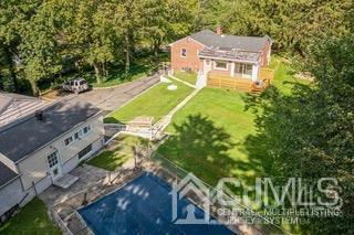 237 Amboy Road Old Bridge, NJ 07747 - Photo 9 of 39 an aerial view of a house with a yard