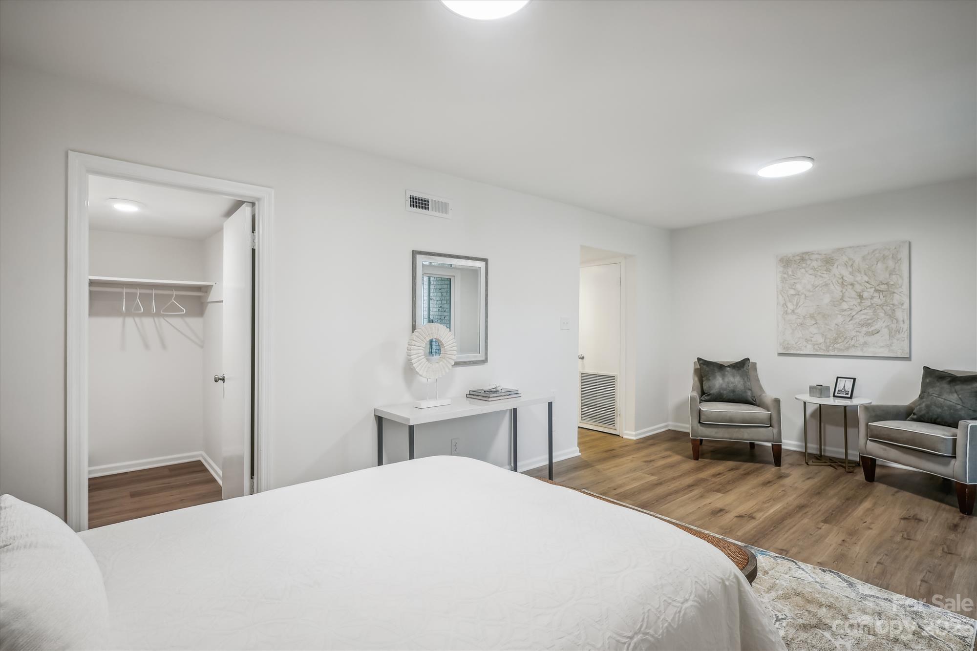 3504 Colony Road, Unit N Charlotte, NC 28211 - Photo 29 of 40 a bedroom with a bed and furniture