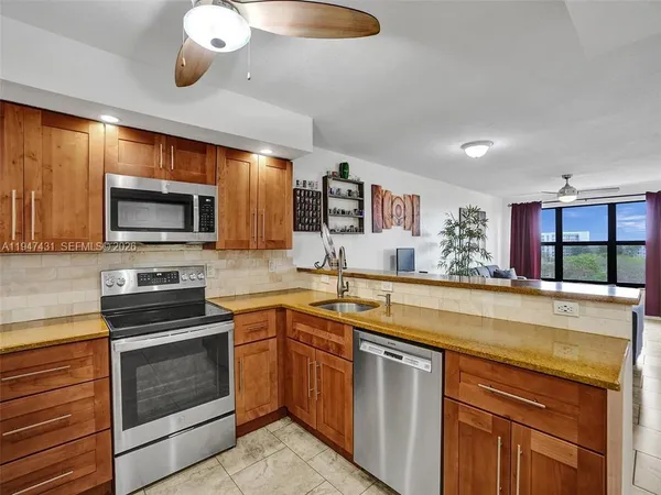 a bathroom with a toilet a sink and a mirror