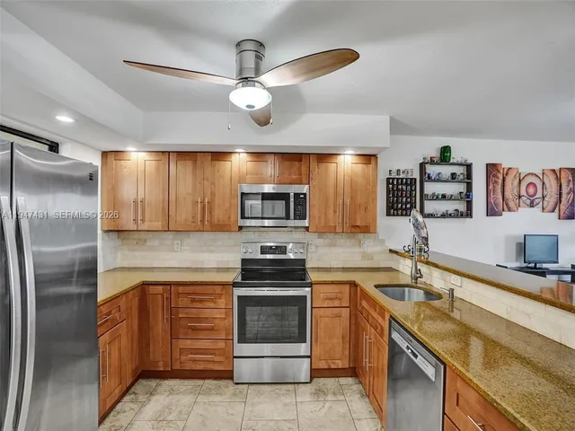 a view of a swimming pool and a yard