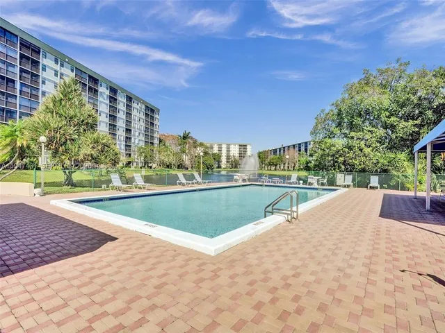 a view of lake with green space