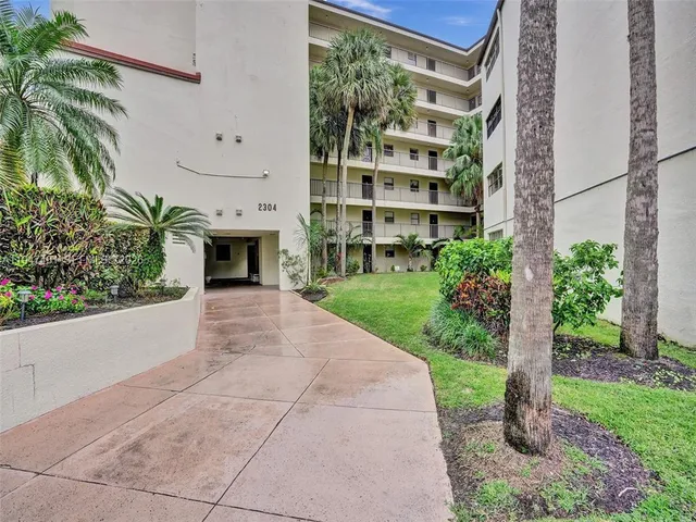 a room with furniture and wooden floor
