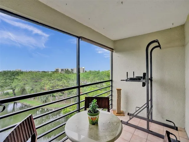 a view of livingroom with furniture and window
