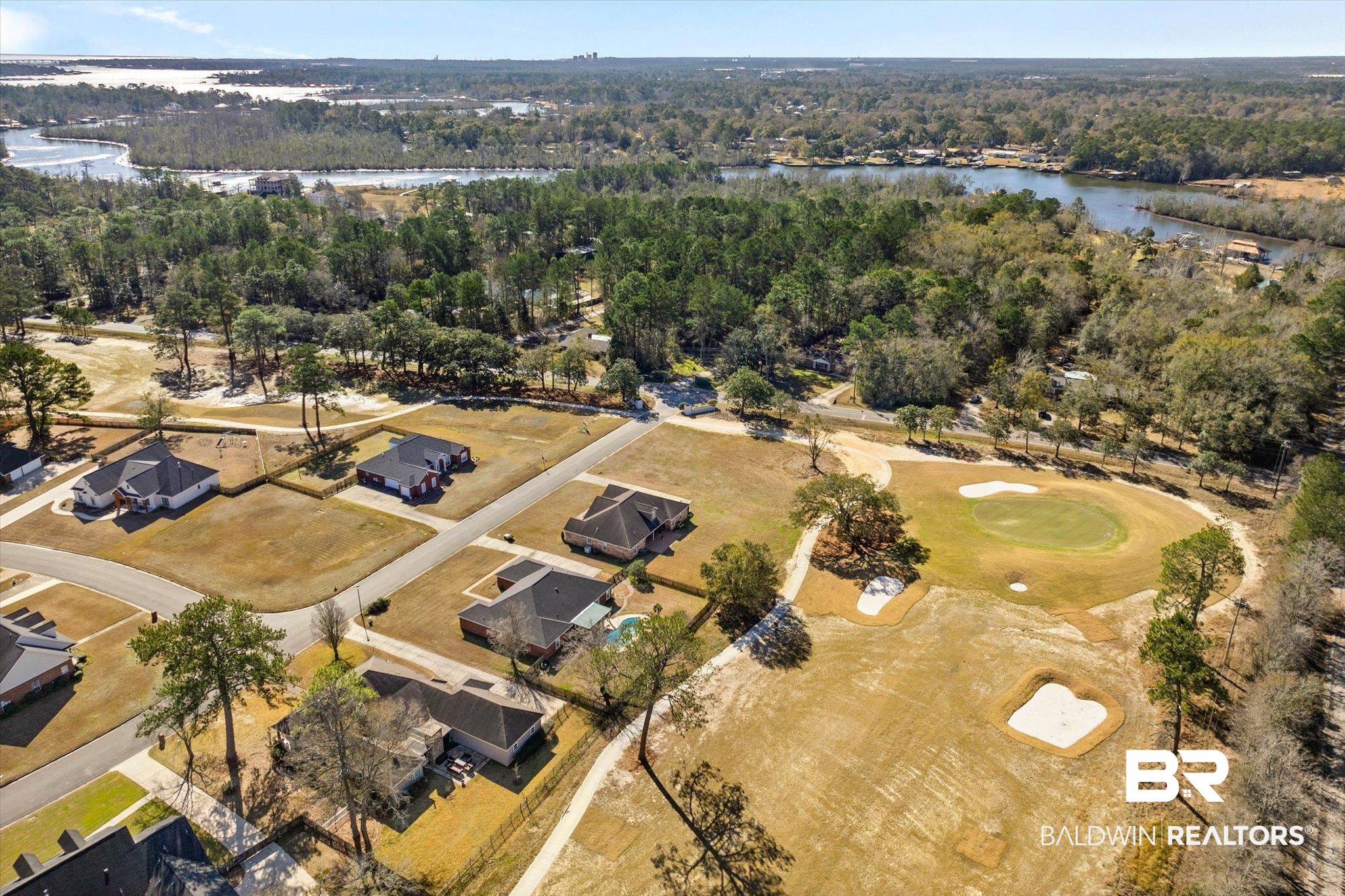 3847 Riviere Du Chien Road Mobile, AL 36693 - Photo 47 of 51 Aerial view of property and surrounding area with a nearby body of water and a golf club
