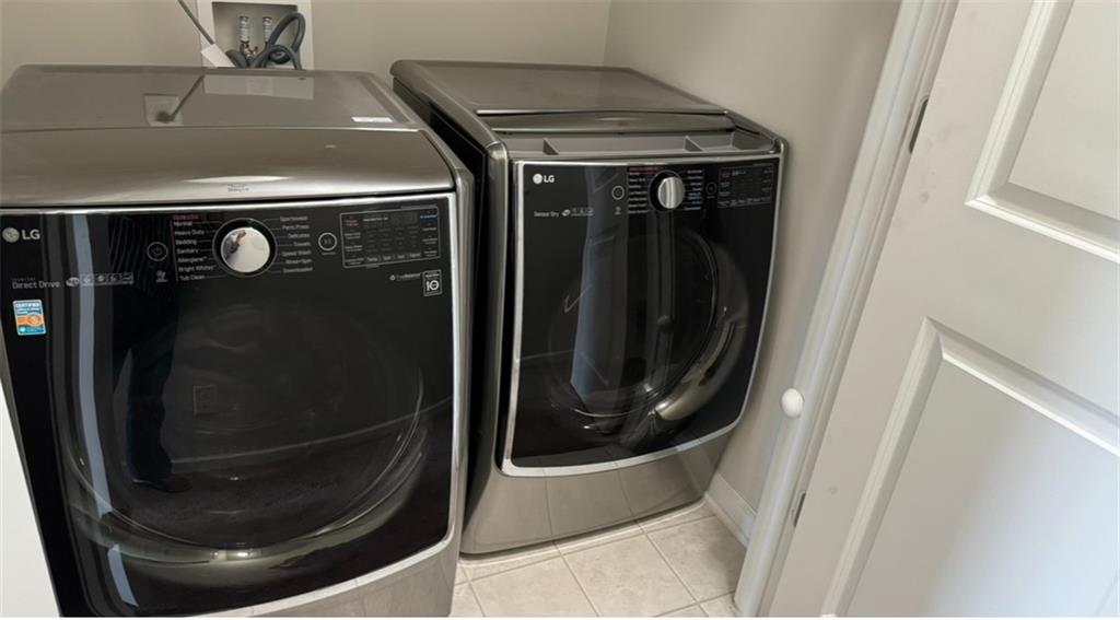 1719 Charcoal Ives Road Lawrenceville, GA 30045 - Photo 12 of 17 a close up view of a washer and dryer