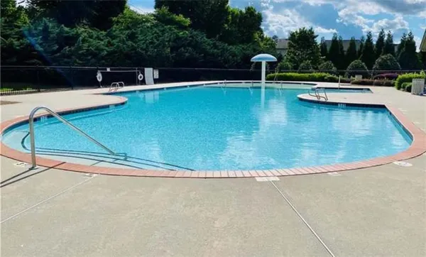 a garden view with a sitting space