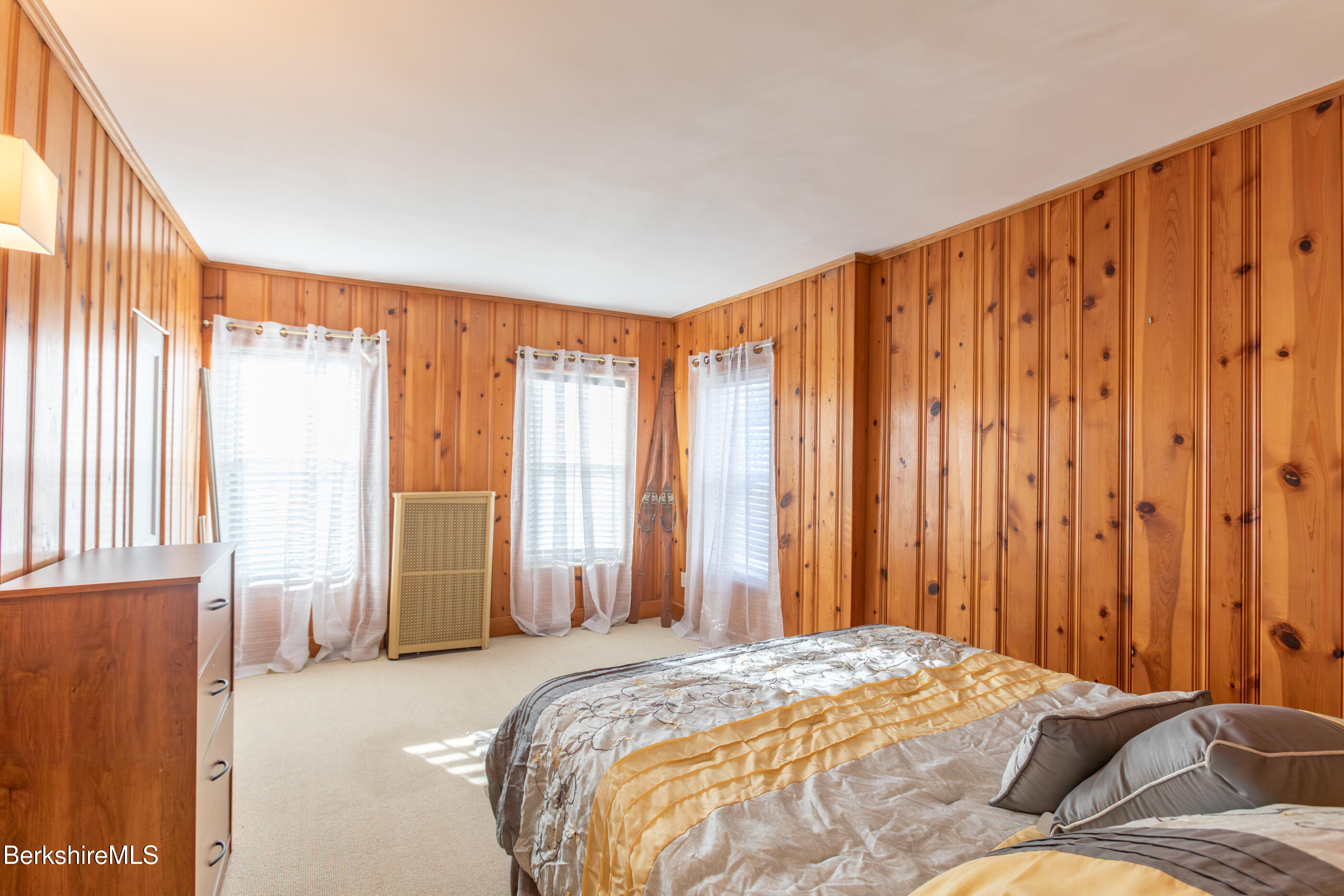 396 Maple Street Hinsdale, MA 01235 - Photo 36 of 47 a bed sitting in a spacious bedroom next to a window