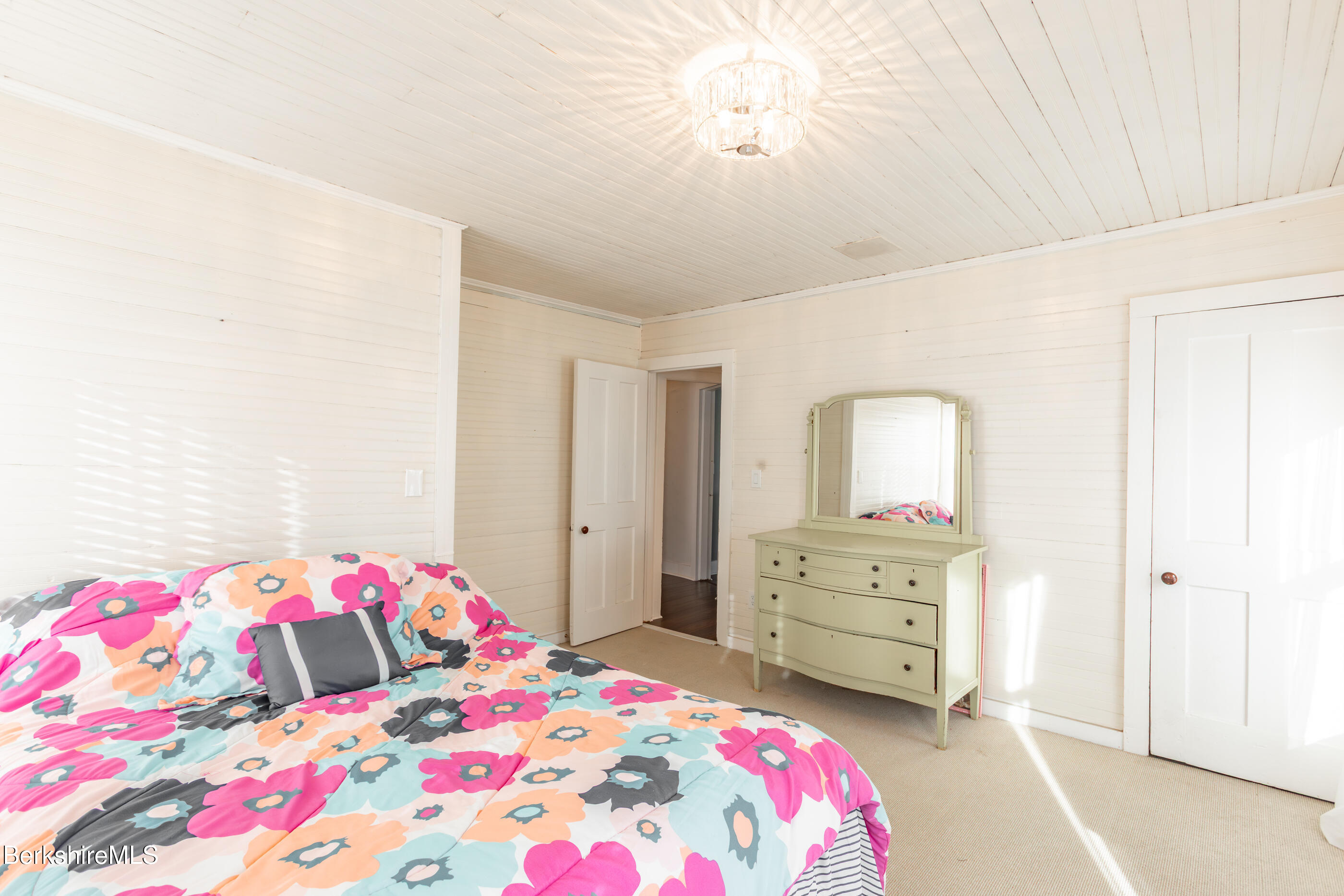 396 Maple Street Hinsdale, MA 01235 - Photo 37 of 47 a bedroom with a bed and a cabinets