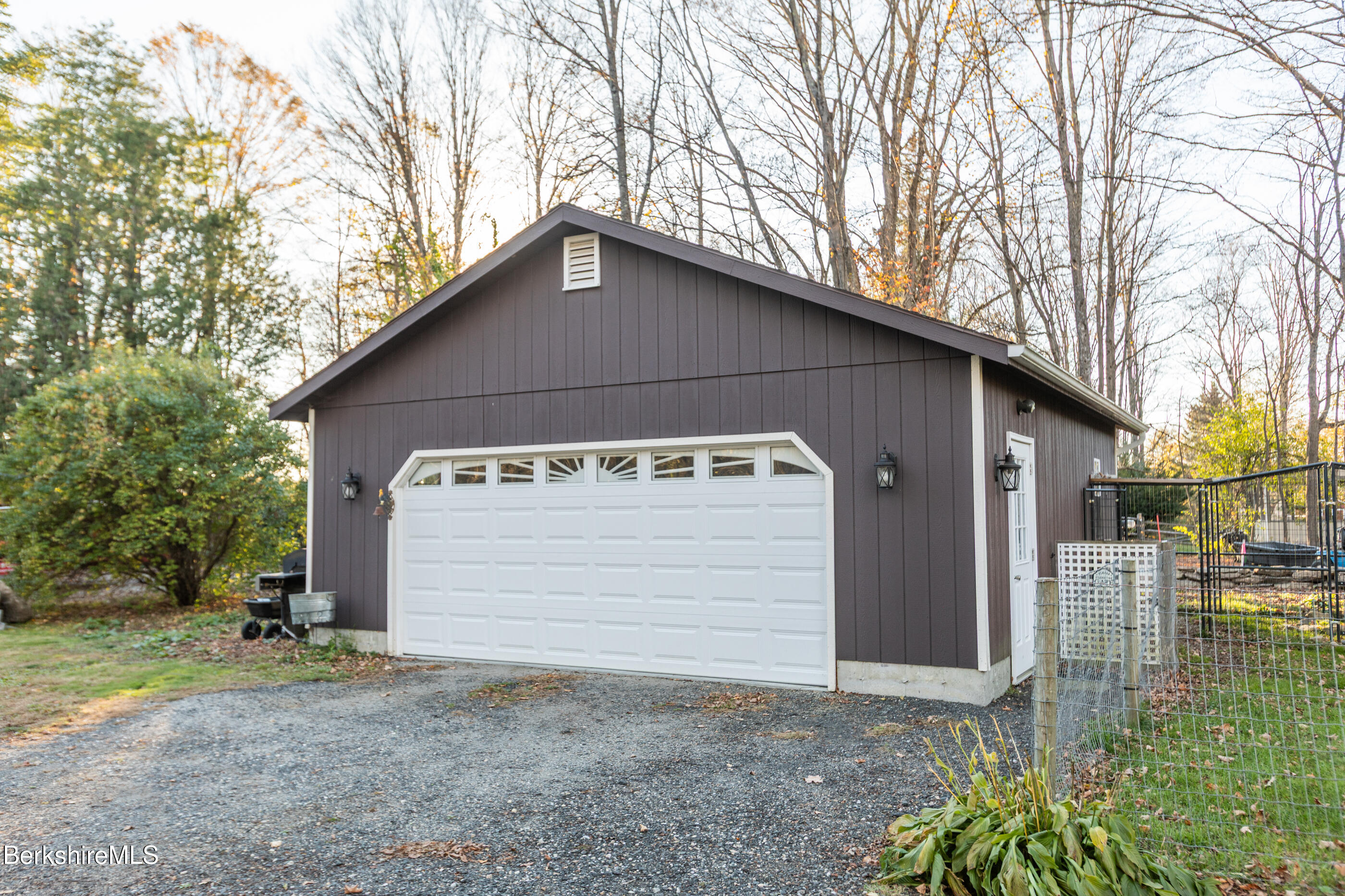 396 Maple Street Hinsdale, MA 01235 - Photo 40 of 47 a front view of house with garage