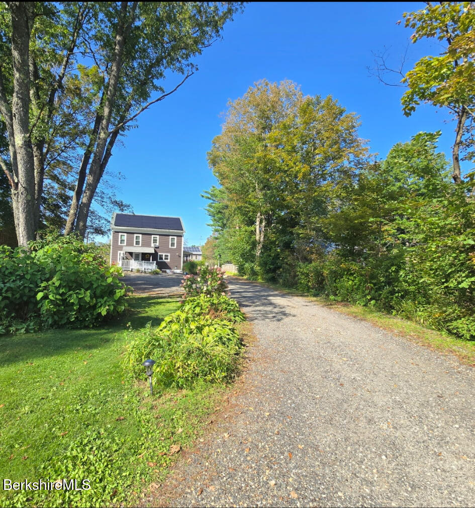 396 Maple Street Hinsdale, MA 01235 - Photo 42 of 47 a view of a house with a yard