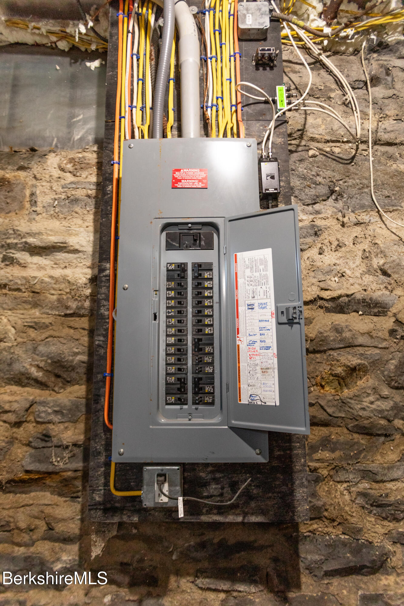 396 Maple Street Hinsdale, MA 01235 - Photo 44 of 47 a front view of a building with a yard