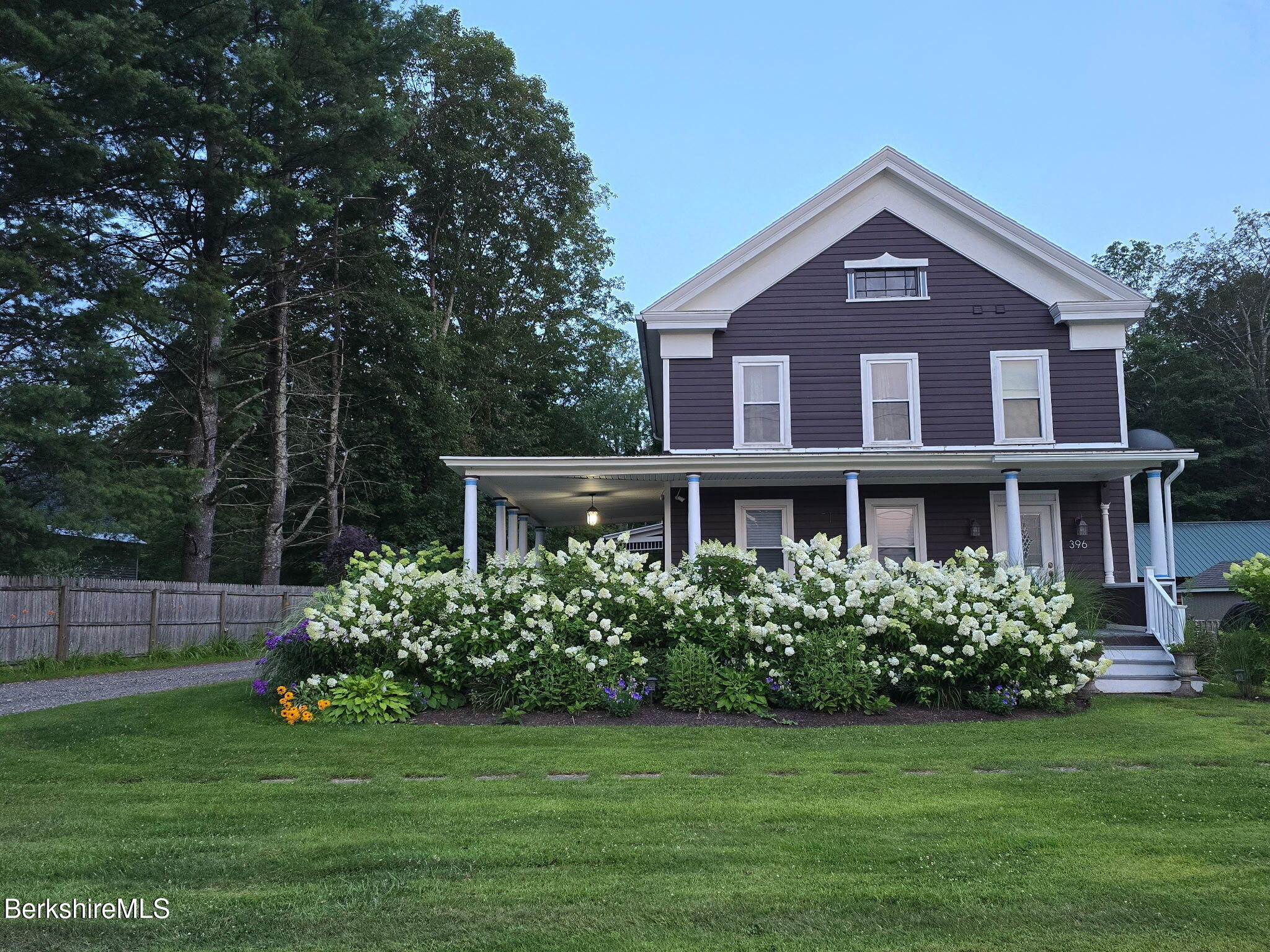 396 Maple Street Hinsdale, MA 01235 - Photo 47 of 47 a front view of a house with garden