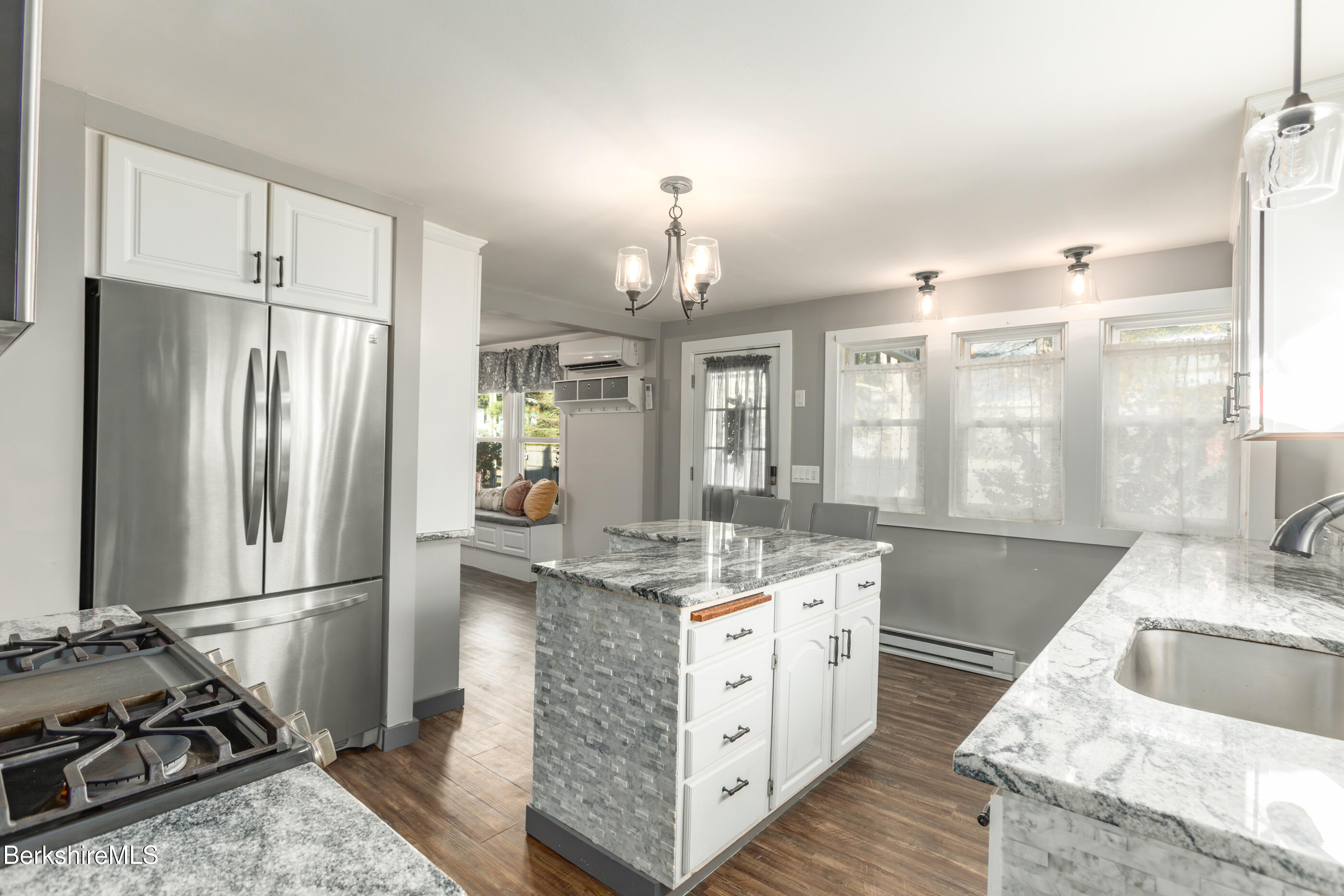396 Maple Street Hinsdale, MA 01235 - Photo 9 of 47 a kitchen with stainless steel appliances granite countertop a sink stove and refrigerator