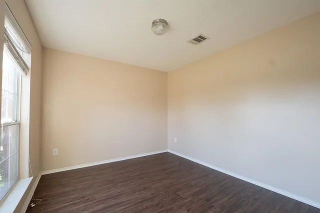 a view of small space with wooden floor