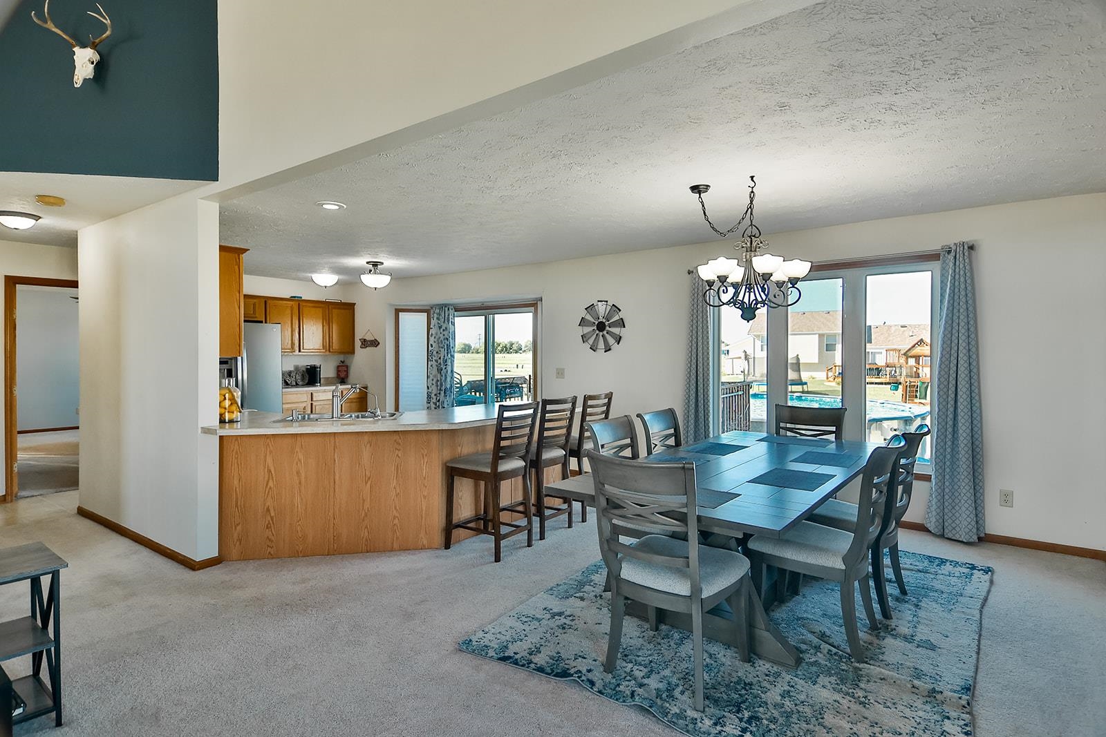 381 Red Fox Drive Davis Junction, IL 61020 - Photo 12 of 38 a view of a dining room with furniture and window
