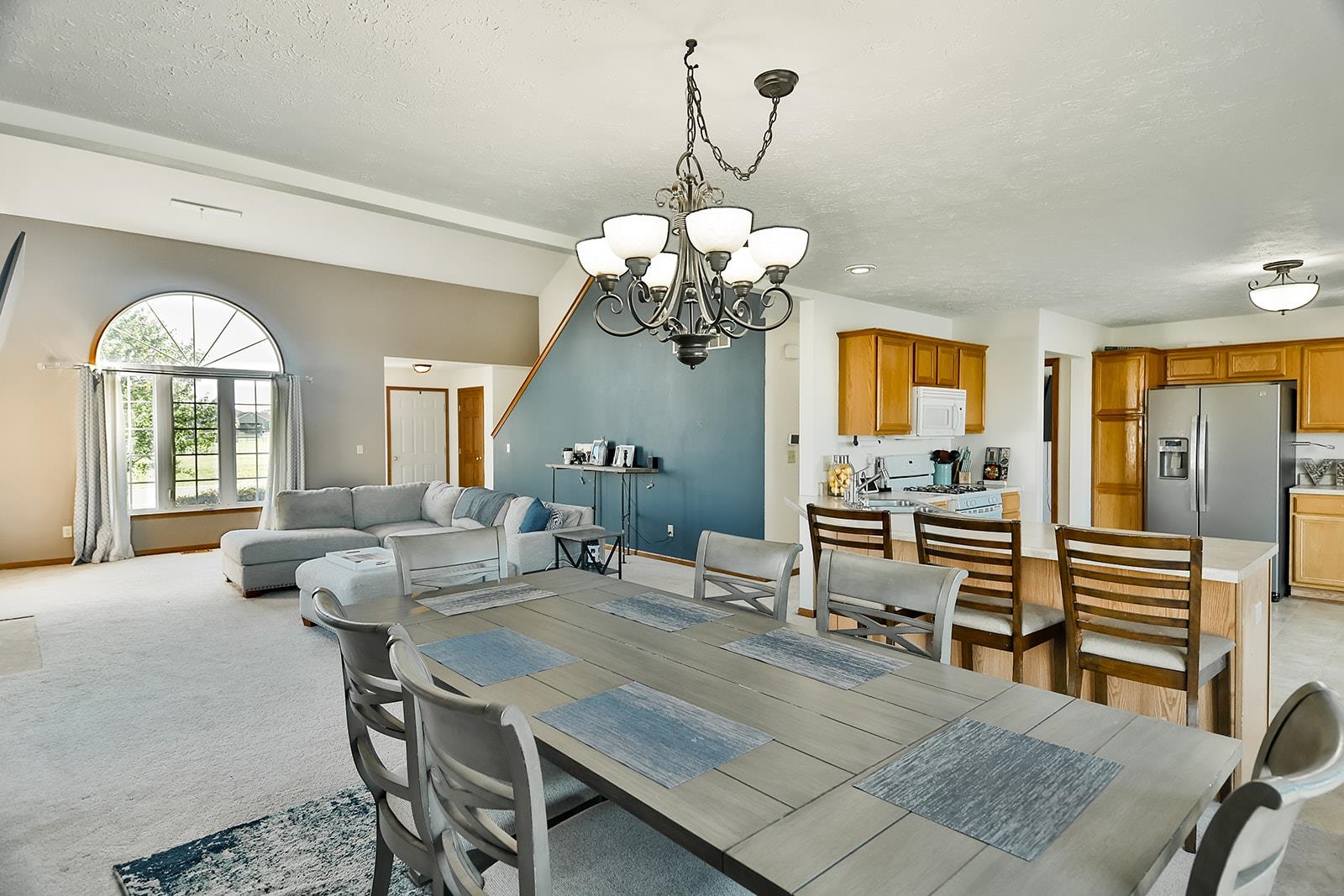 381 Red Fox Drive Davis Junction, IL 61020 - Photo 14 of 38 a view of a dining room with furniture and a chandelier