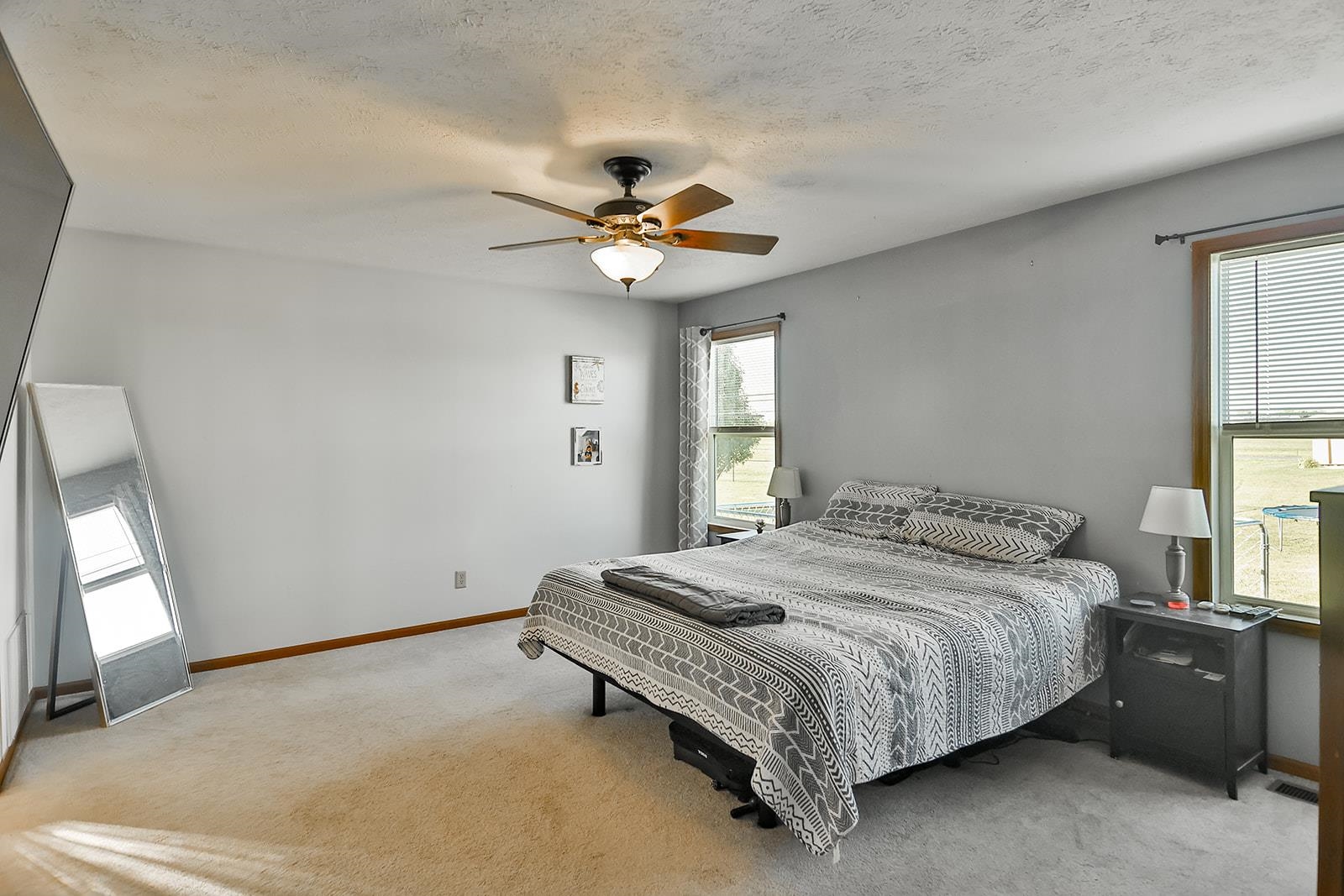 381 Red Fox Drive Davis Junction, IL 61020 - Photo 20 of 38 a bedroom with a bed chandelier and a window