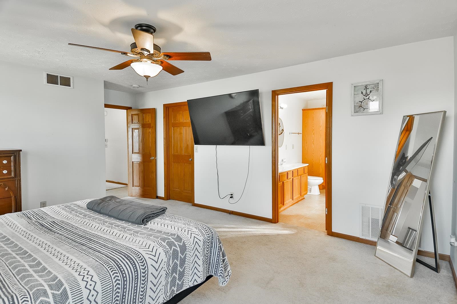 381 Red Fox Drive Davis Junction, IL 61020 - Photo 22 of 38 a bedroom with a bed and a flat screen tv