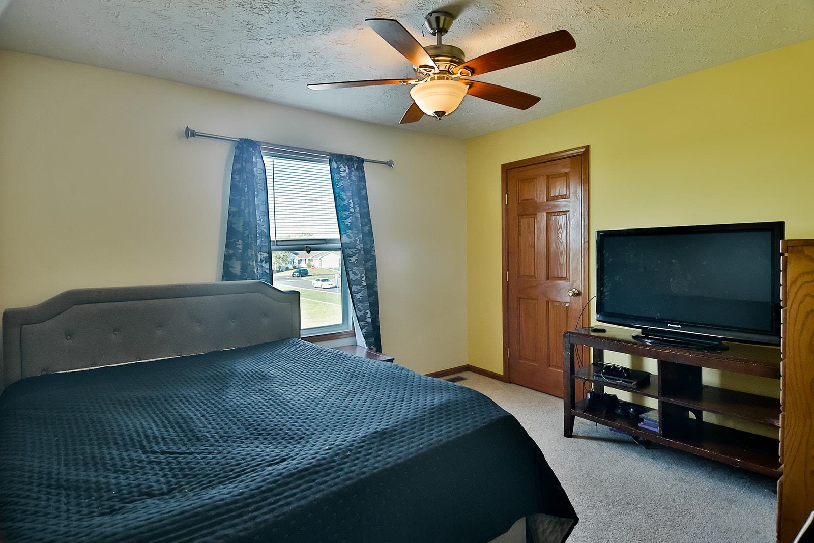 381 Red Fox Drive Davis Junction, IL 61020 - Photo 33 of 38 a bedroom with a bed and a flat screen tv