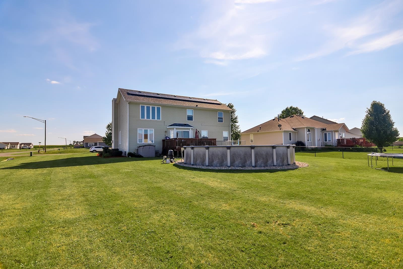381 Red Fox Drive Davis Junction, IL 61020 - Photo 4 of 38 a view of a house with a yard and sitting area