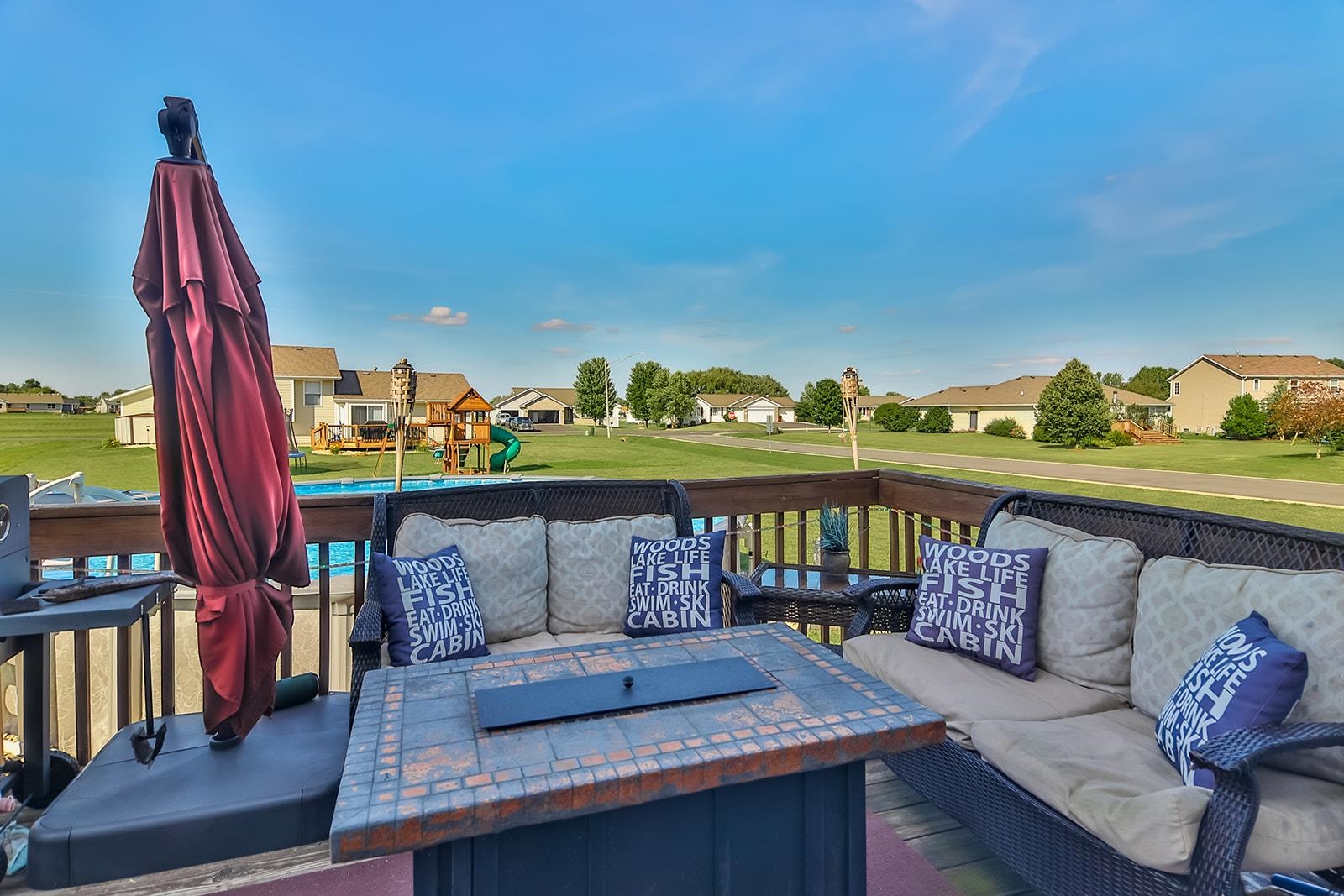 381 Red Fox Drive Davis Junction, IL 61020 - Photo 5 of 38 a roof deck with couches and potted plants