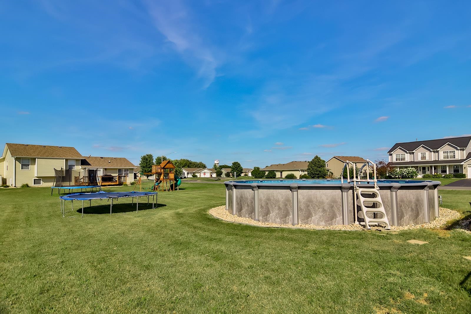 381 Red Fox Drive Davis Junction, IL 61020 - Photo 6 of 38 a view of a lake with a houses in the background