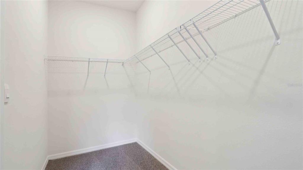 12773 Northwest 13th Lane Gainesville, FL 32606 - Photo 20 of 24 a view of small space with racks on the wall