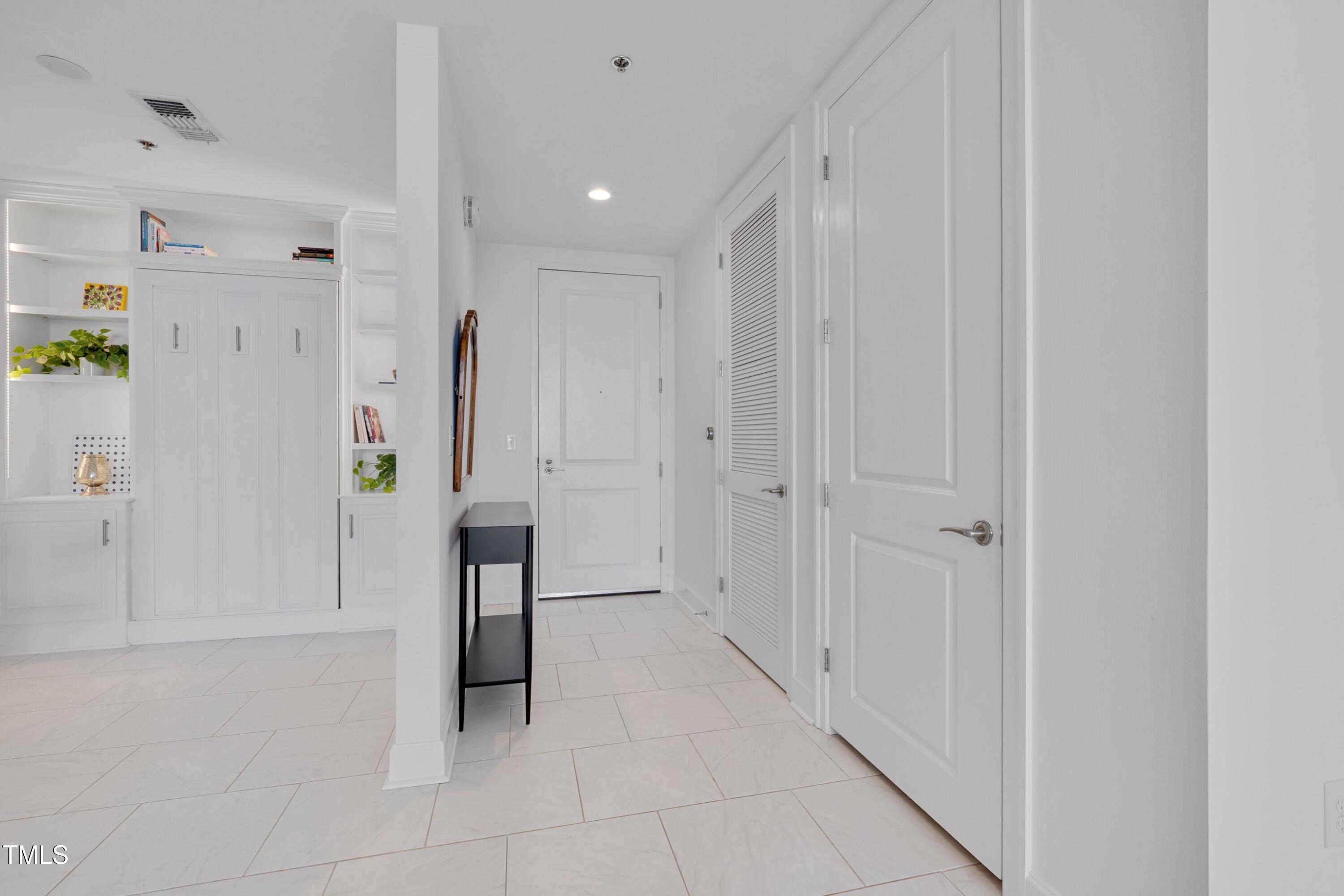 301 Fayetteville Street, Unit 2611 Raleigh, NC 27601 - Photo 15 of 44 a view of entryway with white walls
