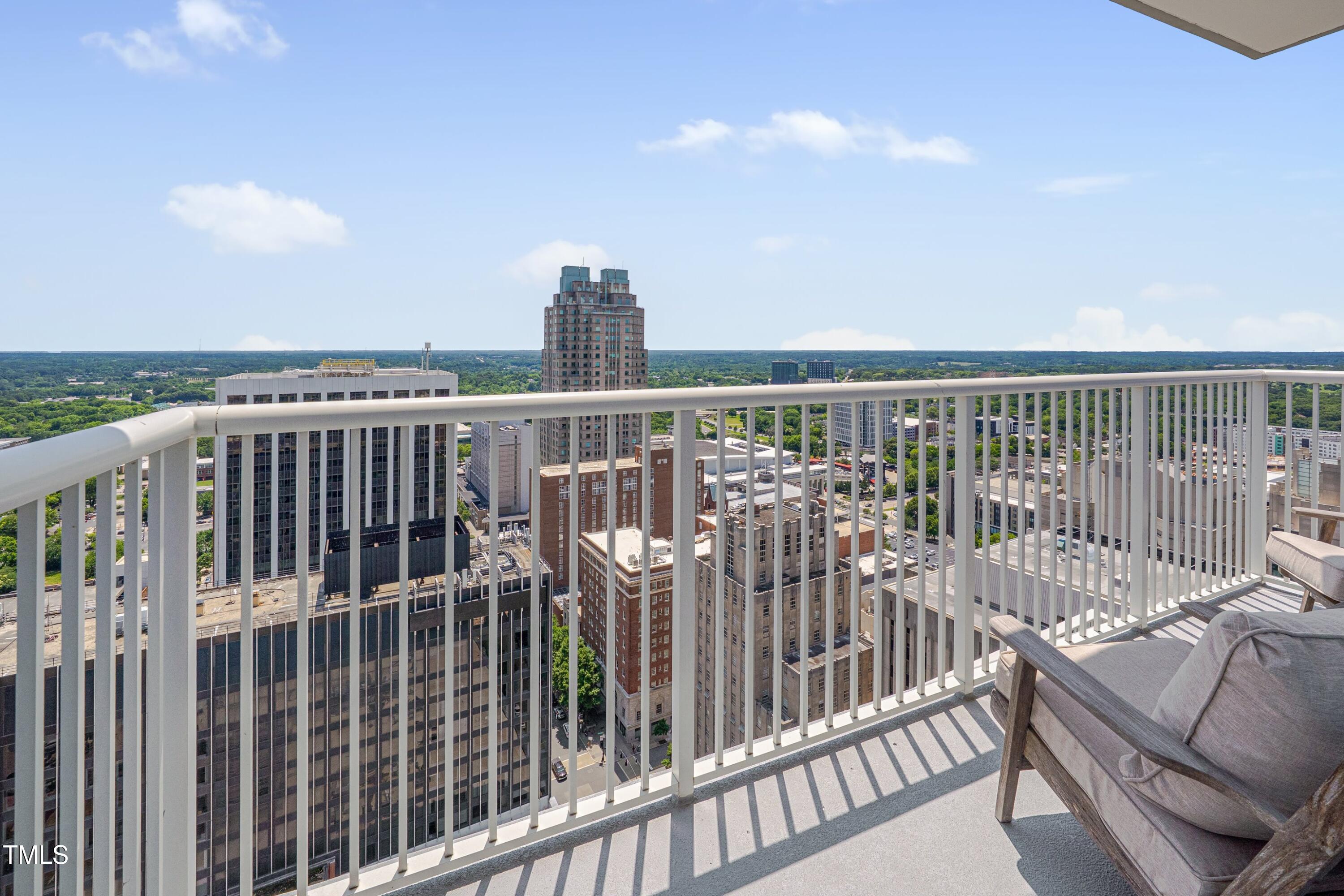 301 Fayetteville Street, Unit 2611 Raleigh, NC 27601 - Photo 23 of 44 a view of balcony with furniture
