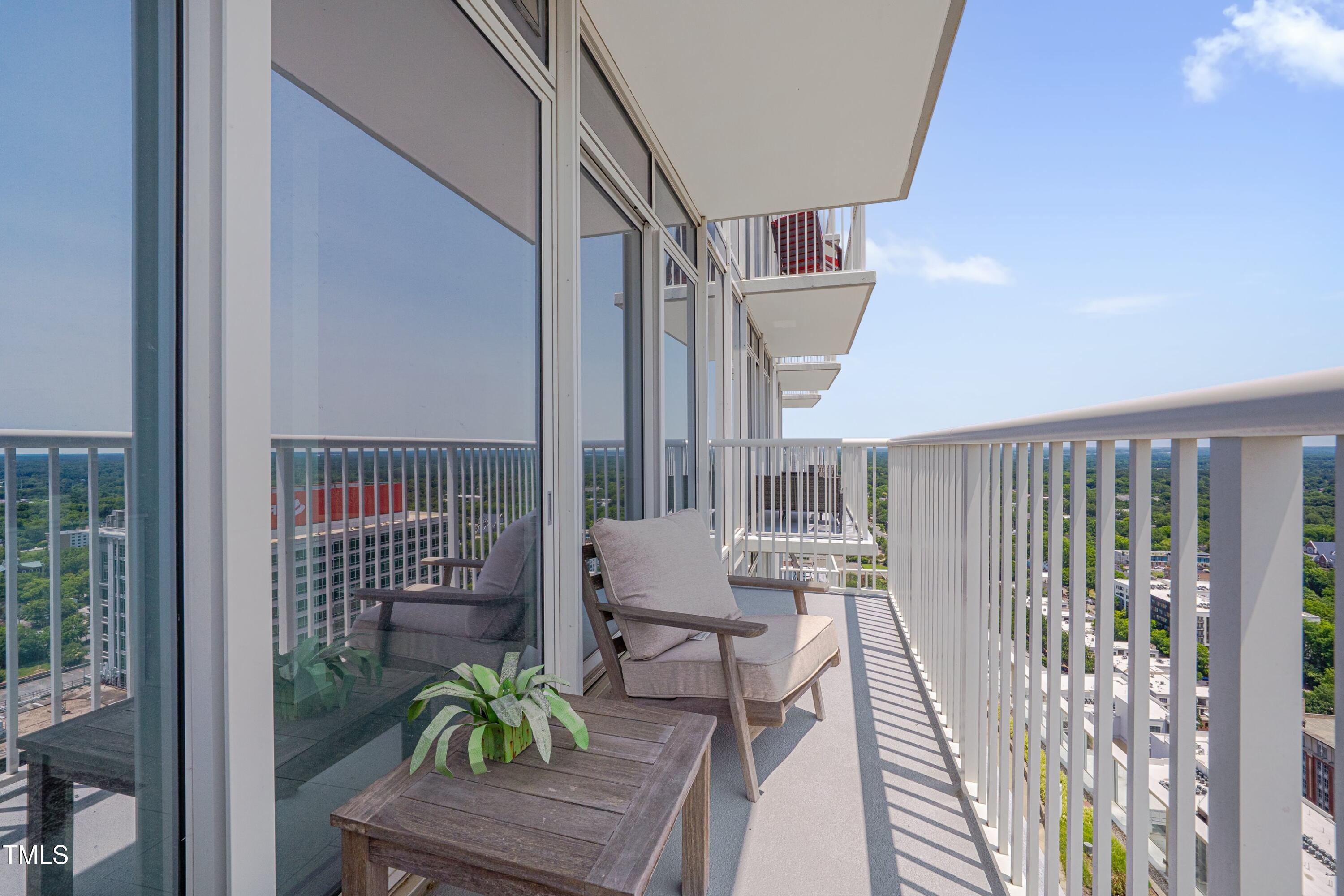 301 Fayetteville Street, Unit 2611 Raleigh, NC 27601 - Photo 24 of 44 a view of balcony with furniture