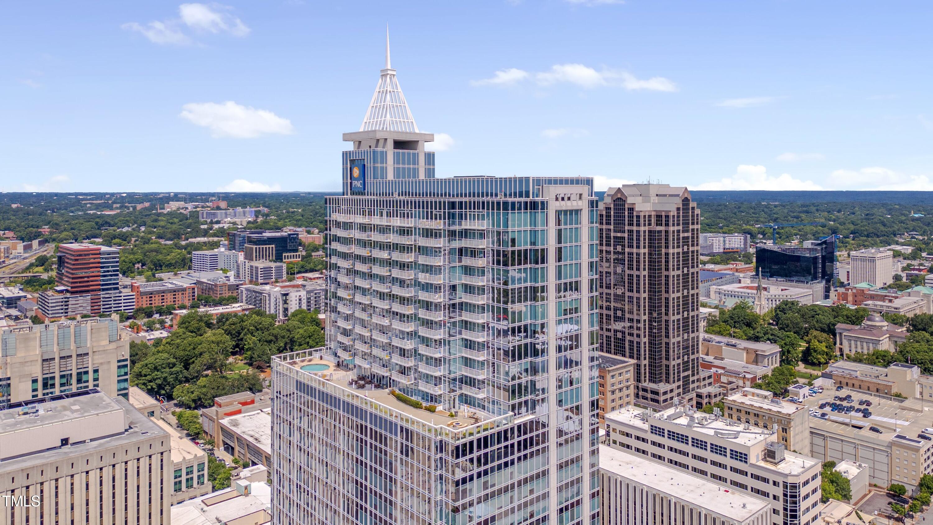 301 Fayetteville Street, Unit 2611 Raleigh, NC 27601 - Photo 28 of 44 a view of a city with tall buildings